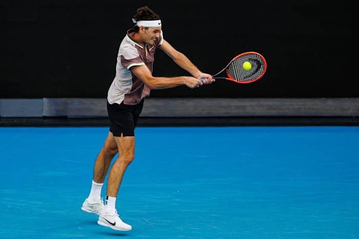 Taylor Fritz hits a shot at the 2024 Australian Open.